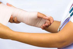 Nurse Taking Care of an Hand Injury